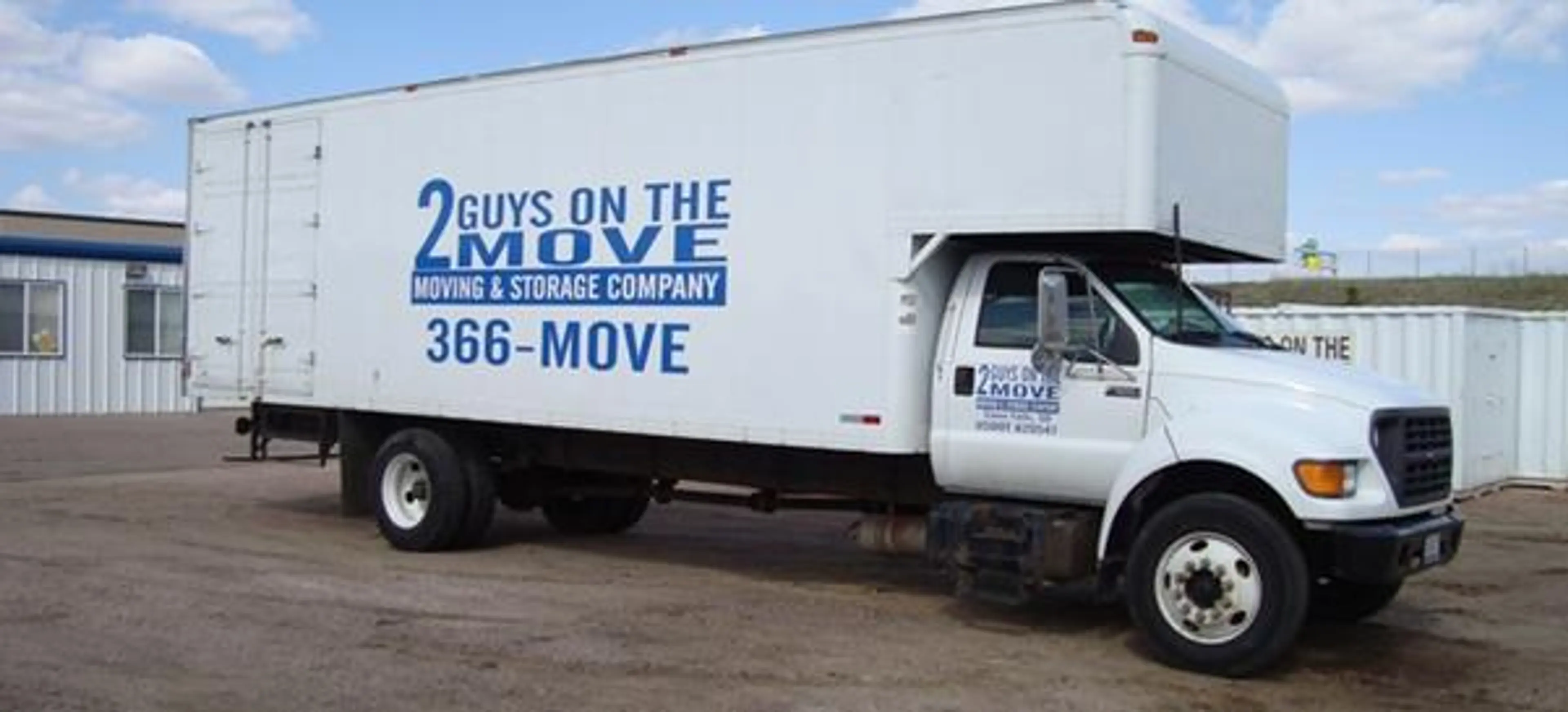 2 Guys on the Move logo